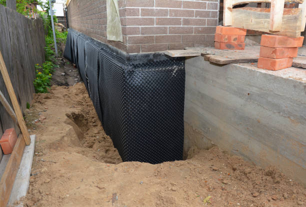 SJ Waterproofing Pros technician performing targeted Waterproofing assessment in Fredericksburg, PA